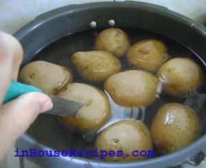 how many whistles to cook potatoes