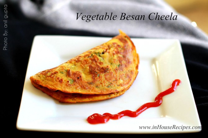 Vegetable besan chilla served with Tomato sauce